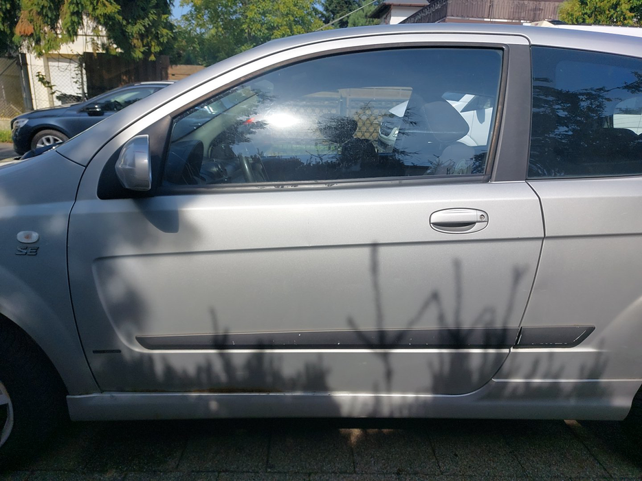 Zdjęcie drzwi przednich lewych wraz z szybą